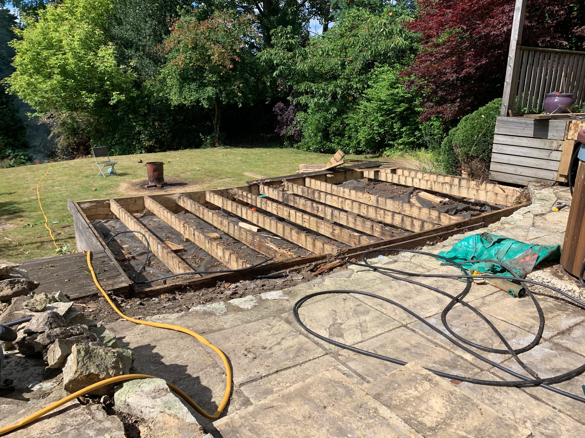Rotten decking being removed